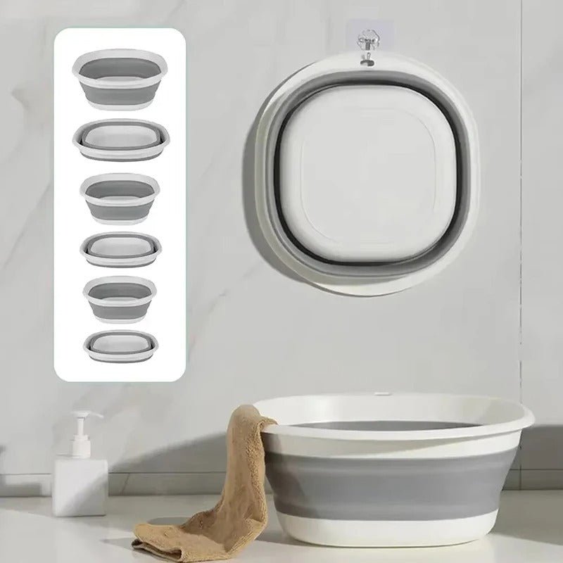 Baignoire bébé pliante grise et blanche – gain de place, suspendue au mur et dépliée pour le bain