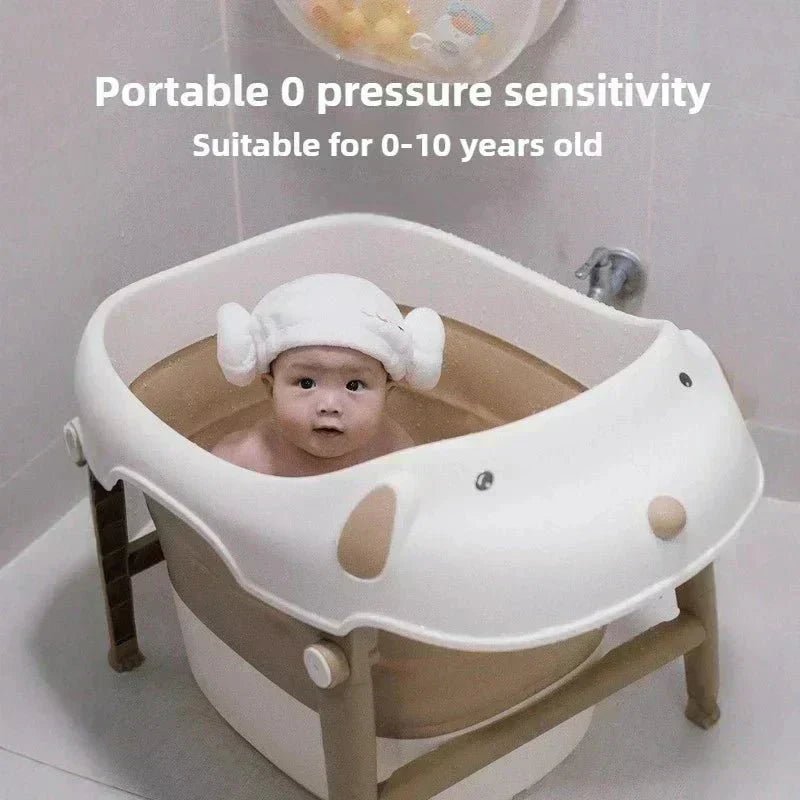 Baignoire bébé pliable rose compacte et pratique