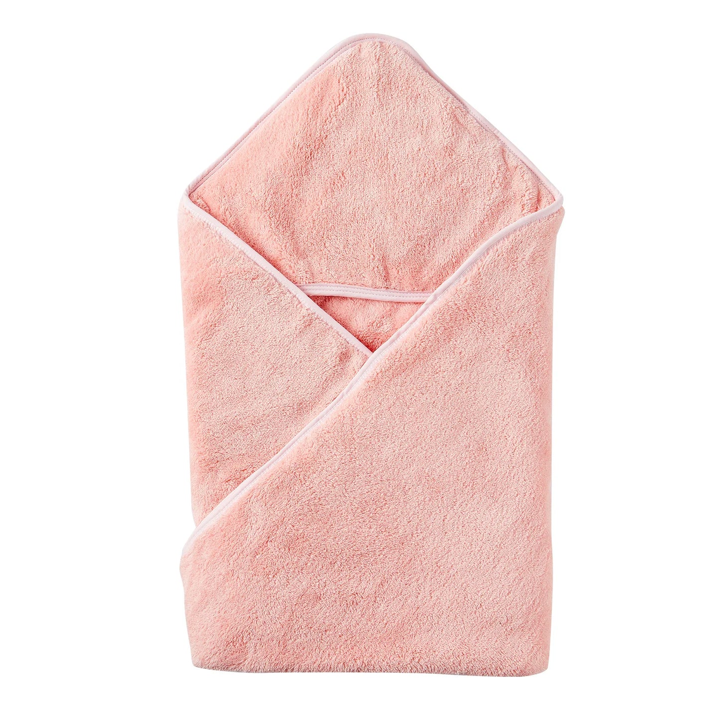 Bébé enveloppé dans serviette capuche lapin rose