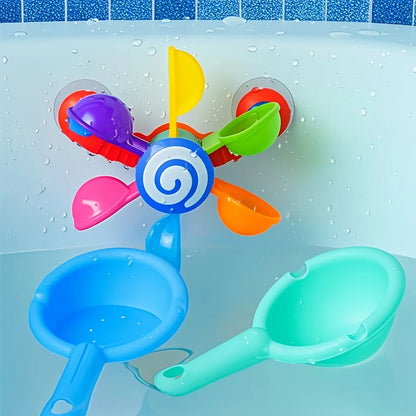 Bébé jouant avec jouet de bain rotatif