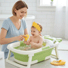 Baignoire bébé pliable verte, gain de place compacte.