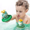 Grenouille de bain lumineuse qui arrose l'eau