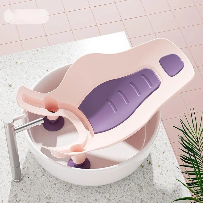 Siege de bain bebe  a placer dans le lavabo.