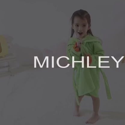 Détail capuche dinosaure peignoir bébé verte