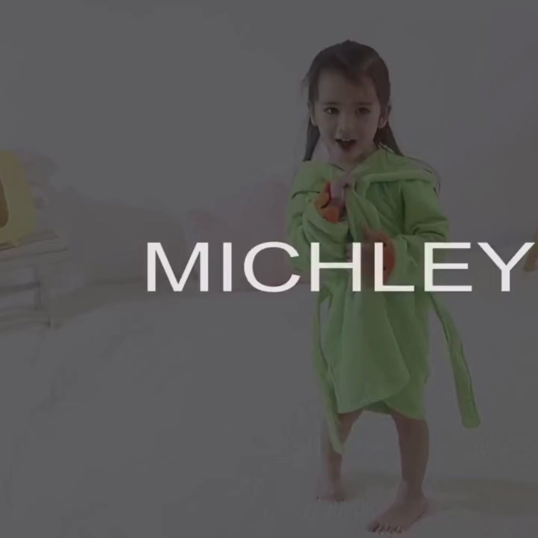 Détail capuche dinosaure peignoir bébé verte